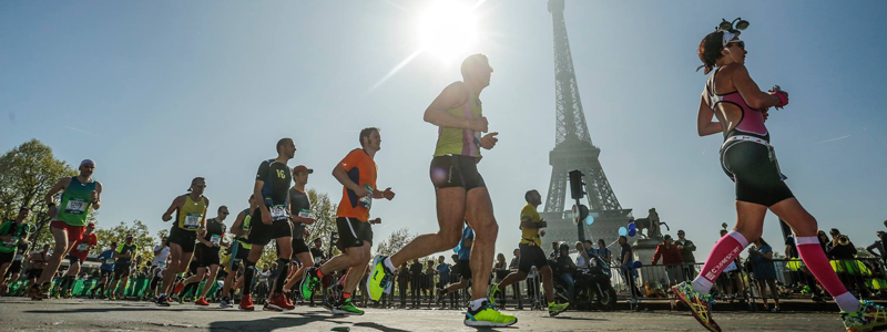 Runners mid-race during the Paris Marathon