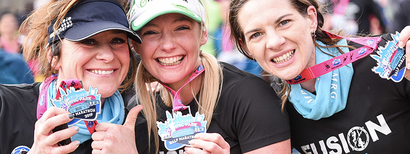 Runners celebrating at the Olympic Half Marathon
